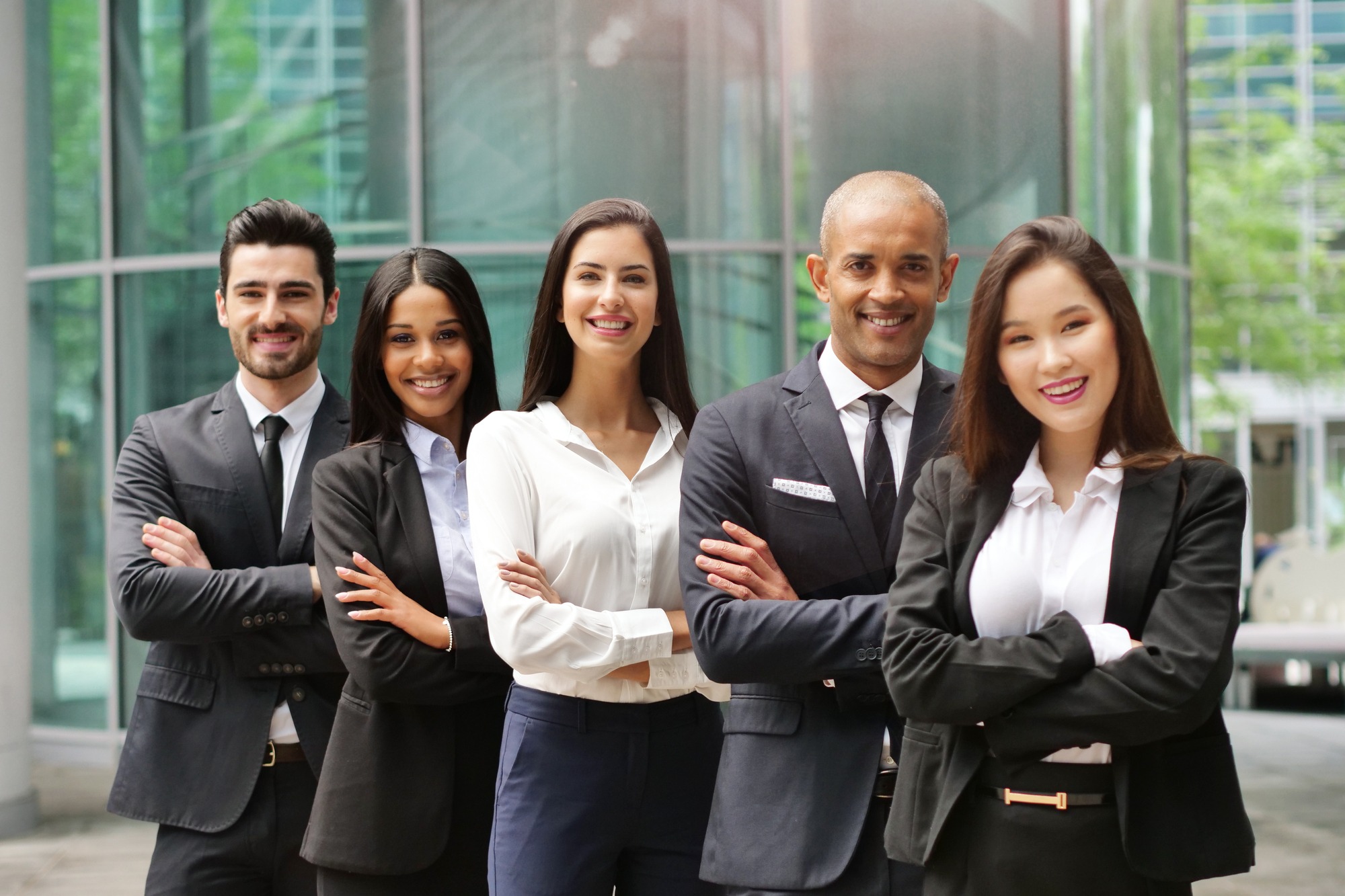 People of different ethnic backgrounds dressed in suits